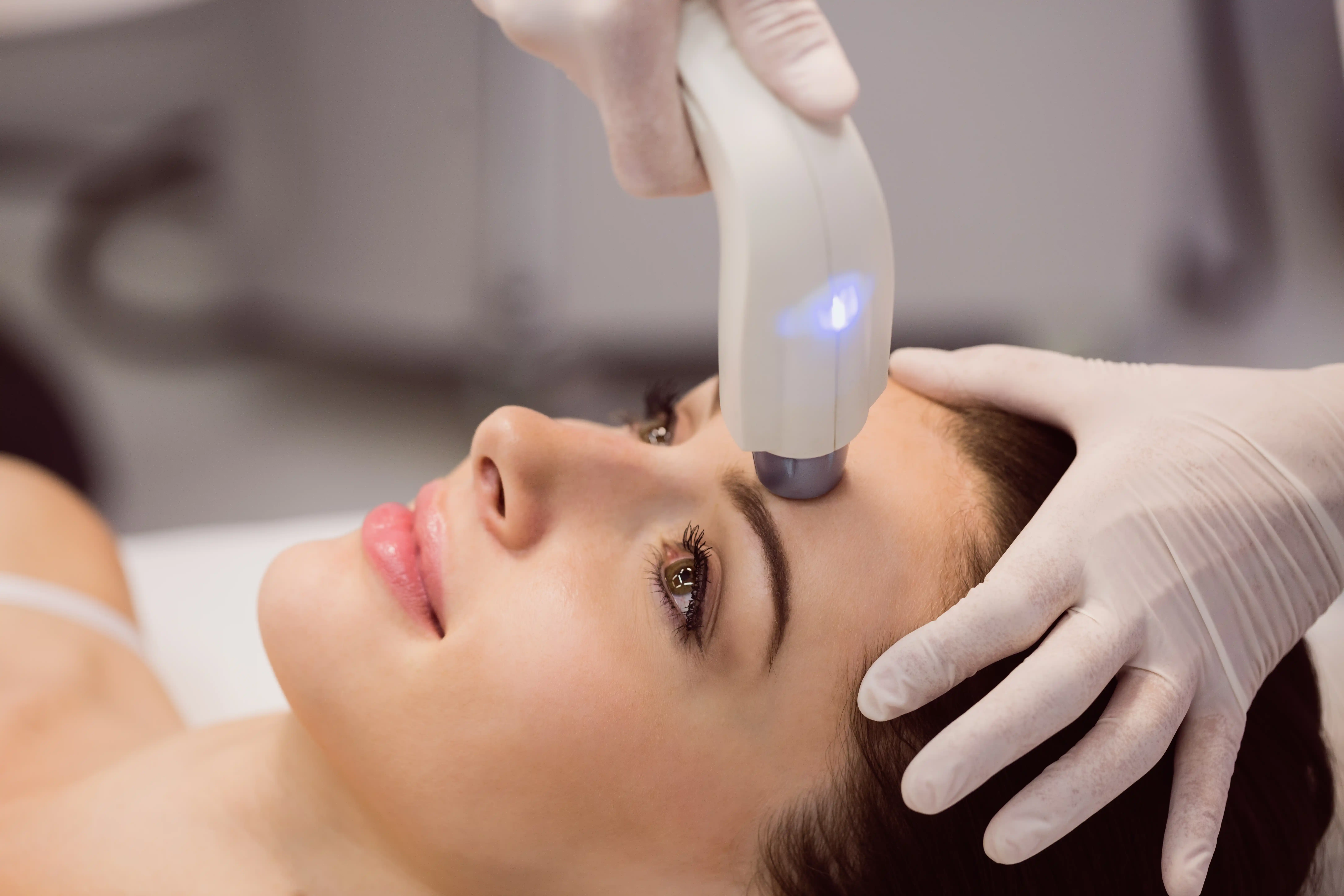 female-patient-receiving-cosmetic-treatment female-patient-receiving-cosmetic-treatment